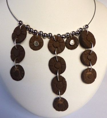 120. Aardewerk en zilver € 24,50